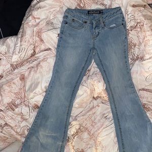 light wash bell bottom low waisted jeans size 8 runs smaller